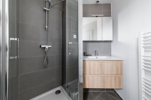 Shower, free toiletries, hair dryer, towels