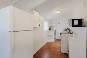 Fridge, microwave, stovetop, cookware/dishes/utensils