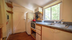 Fridge, microwave, stovetop, cookware/dishes/utensils