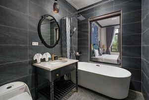 Deluxe Double Room, Bathtub | Bathroom | Shower, hydromassage showerhead, designer toiletries, hair dryer