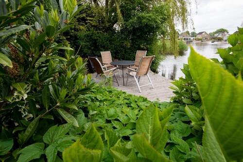 Vakantie-uitje met een privé-aanlegsteiger