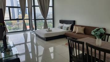 Classic Studio, 1 Queen Bed, City View | Living area | 32-inch LED TV with digital channels