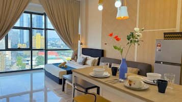 Honeymoon Apartment, 1 Bedroom, Refrigerator & Microwave, Courtyard View | Living area | 42-inch LED TV with digital channels