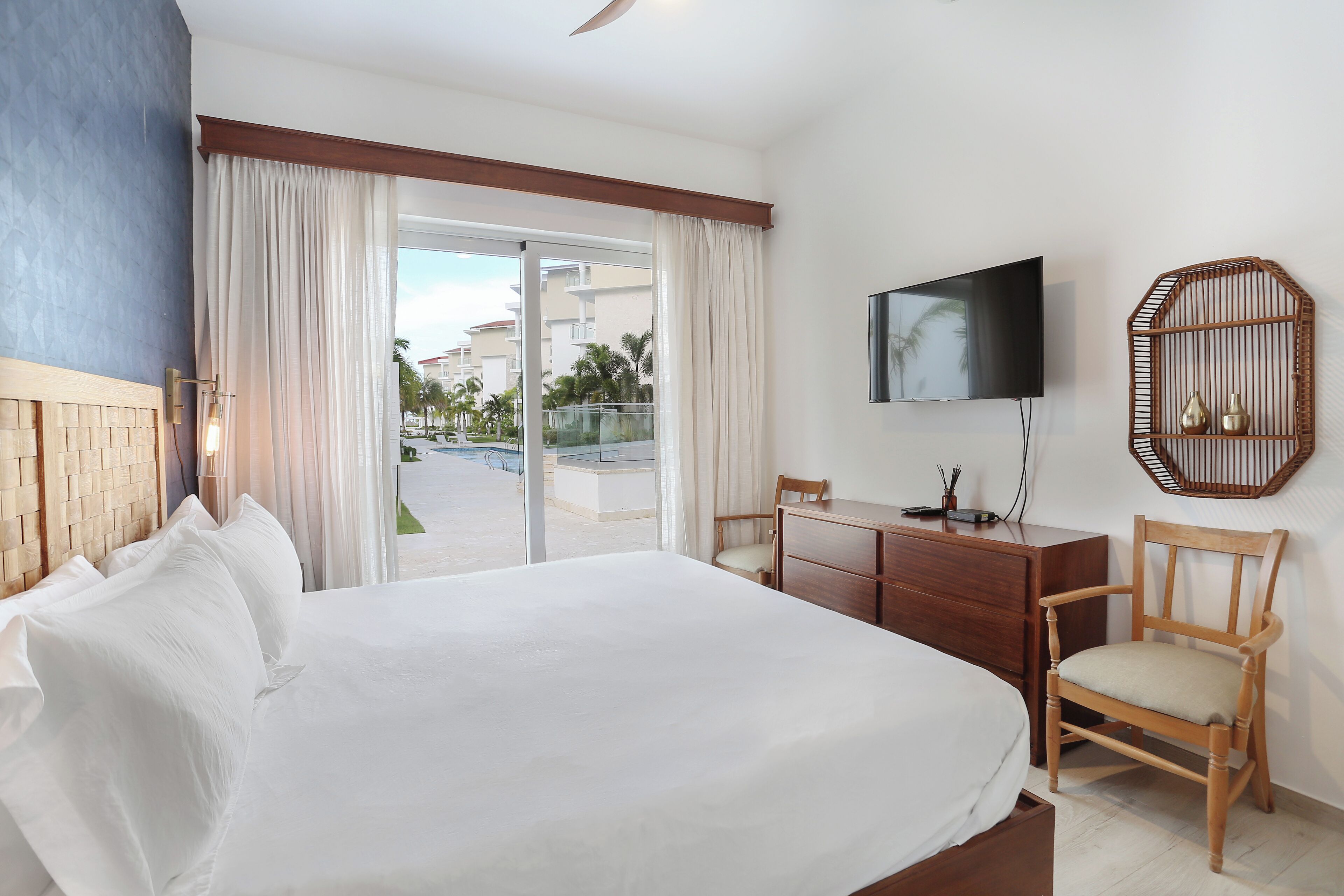 Comfort Suite, 2 Bedrooms, Pool View, Ground Floor | Individually decorated, individually furnished, blackout drapes