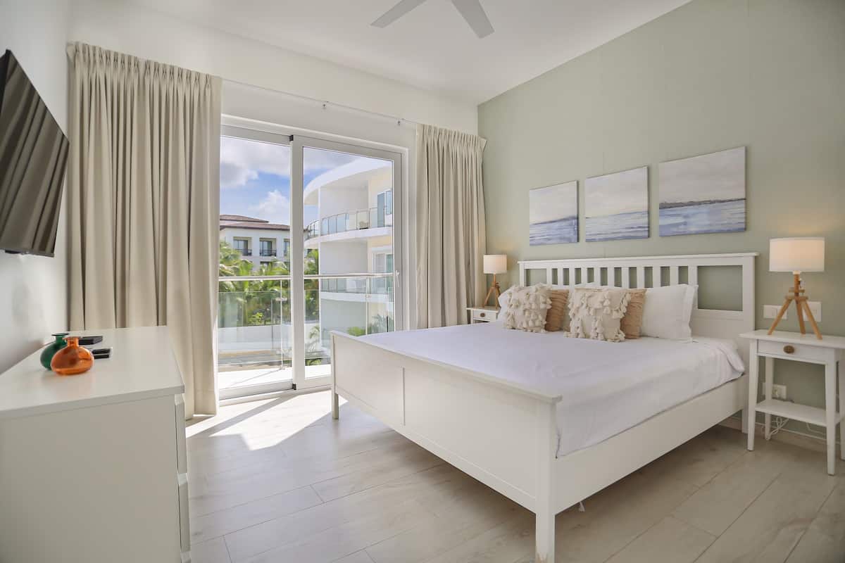 Comfort Suite, 1 Bedroom, Pool View | Individually decorated, individually furnished, blackout drapes