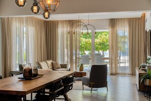 Deluxe Suite | Living area | 55-inch Smart TV with digital channels, Netflix, pay movies