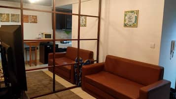 Deluxe Studio | Living area | 40-inch LED TV with digital channels