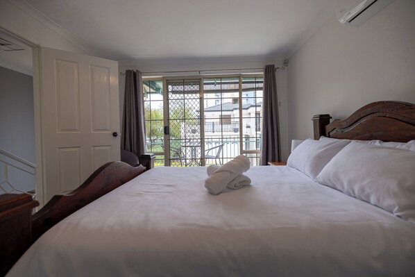 3 عدّة غرف نوم ومكواة/لوح كي وواي فاي مجانًا وملاءات أسرّة