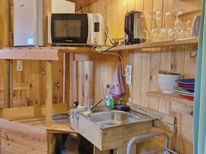 Fridge, microwave, cookware/dishes/utensils