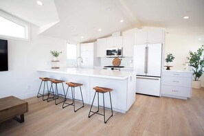 Fridge, microwave, oven, stovetop - 123 30th St B | New Chic Remodel w/ Rooftop Deck (Newport Beach)