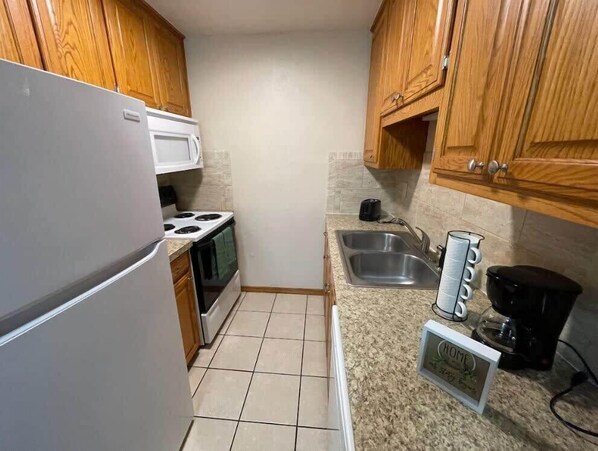 Fridge, microwave, oven, stovetop