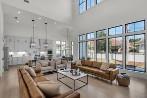 TV, fireplace - 🌊Brand New Destiny West Home-Private Pool-Fab Outdoor Kitchen-4BR Casa Mar🌊 (Destin)