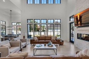 TV, fireplace - 🌊Brand New Destiny West Home-Private Pool-Fab Outdoor Kitchen-4BR Casa Mar🌊 (Destin)