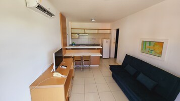 Family Apartment | Living area | 32-inch LED TV with digital channels