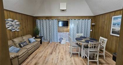 Cozy canal front house with its own boat ramp and dock. Amazing waterfront view.