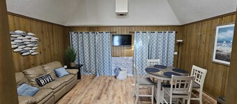 Cozy canal front house with its own boat ramp and dock. Amazing waterfront view.