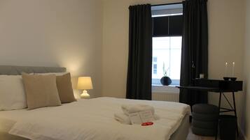 2 bedrooms, desk, iron/ironing board, travel crib