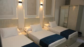 Basic Triple Room | Blackout drapes, free WiFi