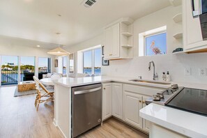 Fridge, microwave, oven, stovetop - Fully renovated waterfront townhome with kayak, SUP, bikes, wagon, chairs, tent! (Pensacola Beach)