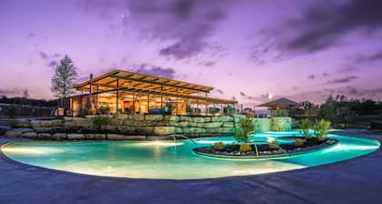 Escape to serene country living at Cow-zy Haus in Fredericksburg, TX