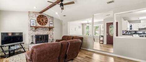 Smart TV, fireplace, books