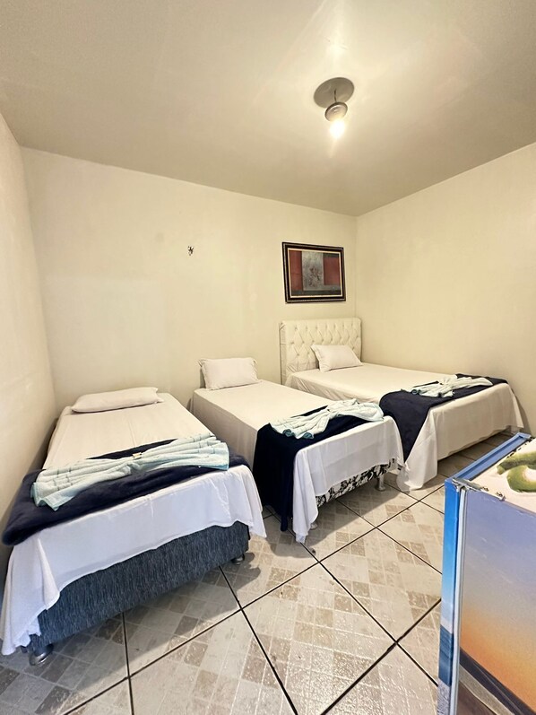 Standard Quadruple Room | Minibar, individually decorated, individually furnished