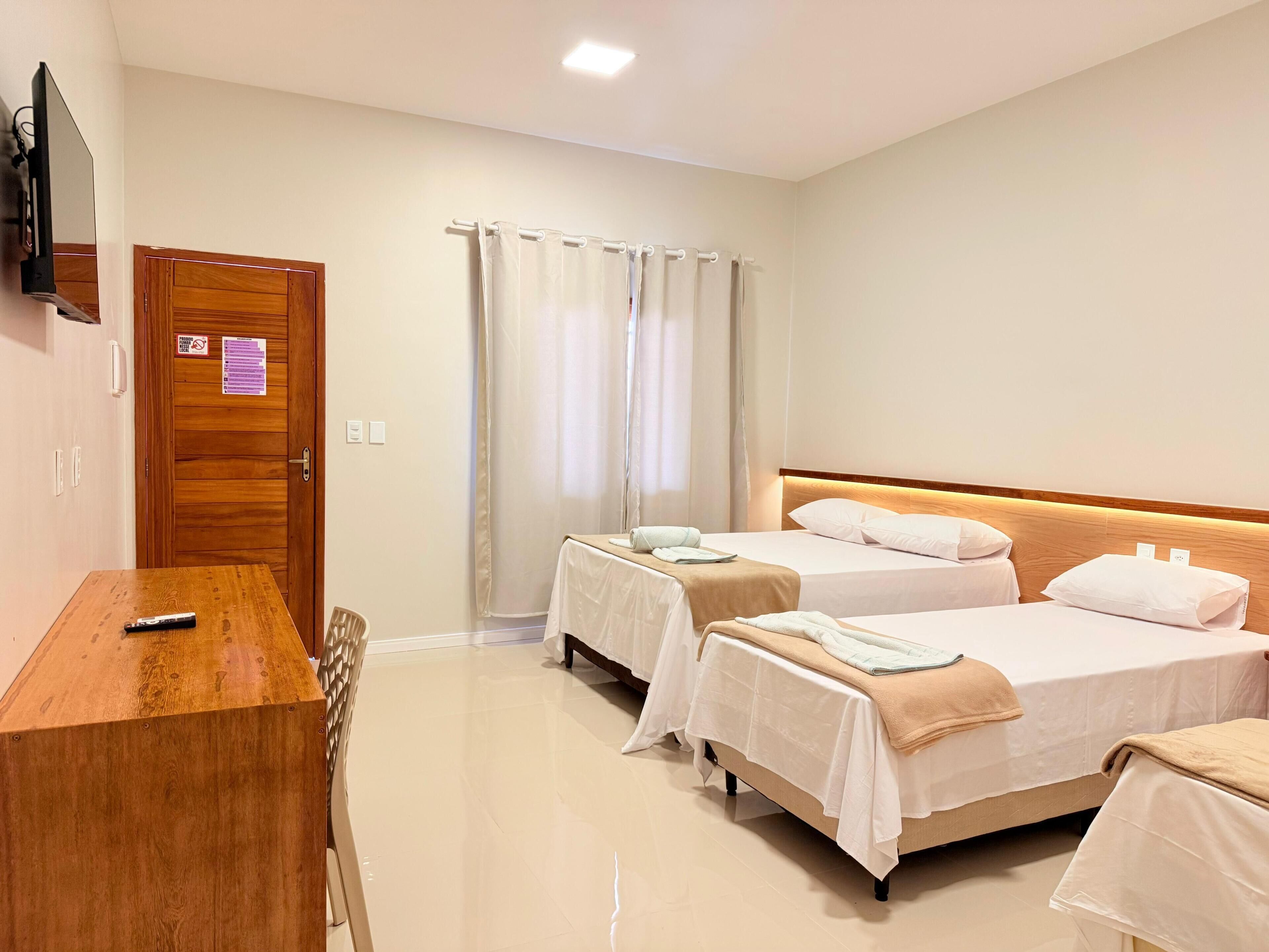 Comfort Quadruple Room | Minibar, individually decorated, individually furnished
