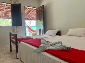 標準三人房, 1 間臥室, 花園景, 花園 | 迷你吧、遮光窗簾/窗簾、熨斗/熨衫板、免費 Wi-Fi