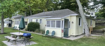 Cottage 4 is a charming 2  bedroom 25’ from your boat dock & Hamlin lake