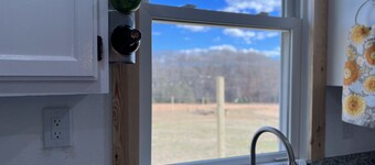 1945 Charming Farmhouse with creek, fire pit and trails