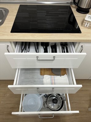Fridge, microwave, stovetop, coffee/tea maker