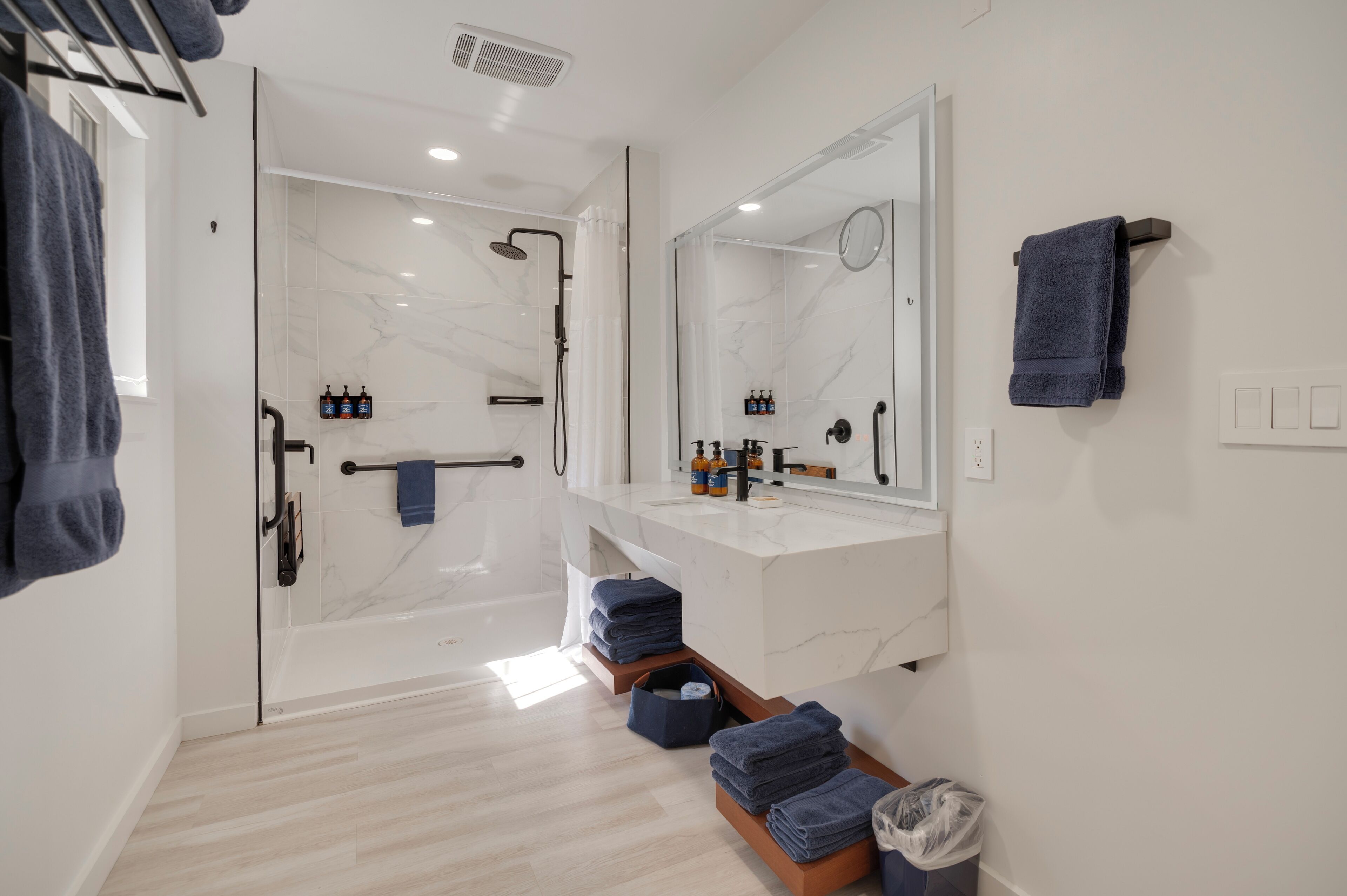 Shower, eco-friendly toiletries, hair dryer, towels