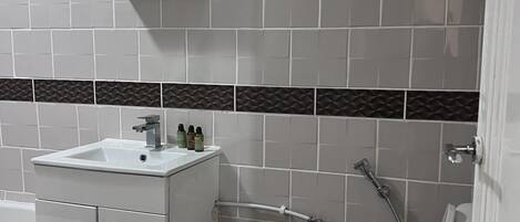 Hair dryer, towels, soap, toilet paper