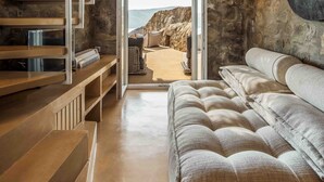 A modern interior with a staircase, a large bed, and a view to the outside. - Villa 'Vagia' with Private Pool, Private Terrace and Air Conditioning (S???f??)