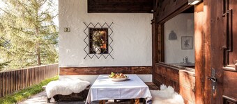 Chalet 'Am Reschensee' con vista sul lago, terrazza privata e giardino privato