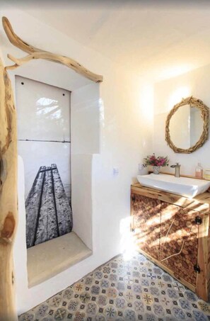 Dutxa, assecador de cabells i tovalloles 