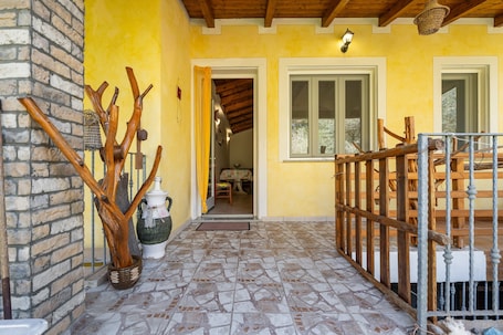 Terrace/patio. Holiday Home 'Villetta Ghisu' with Private Terrace, Private Garden and Air Conditioning
