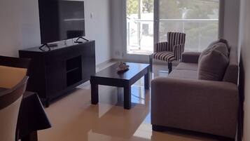 Deluxe Apartment | Living area | Heated floors