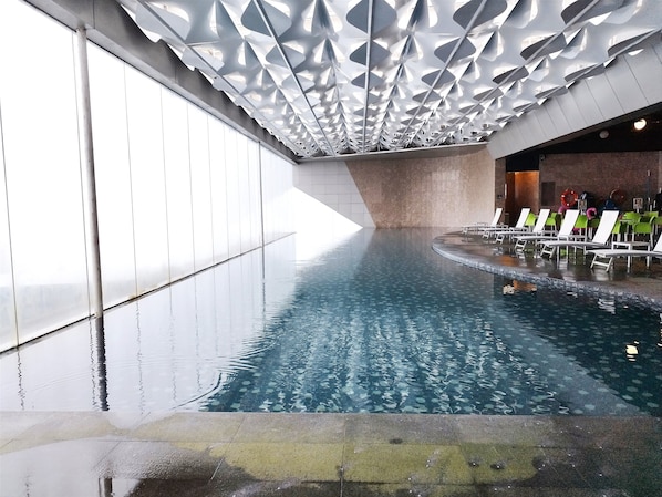 Indoor pool, open 8:00 AM to 9:00 PM, pool loungers - GentingTopSunriseColdsty2R2B7PaxIonDelmn (Genting Highlands)