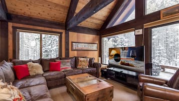 Een smart-tv, een open haard, een dvd-speler en een printer