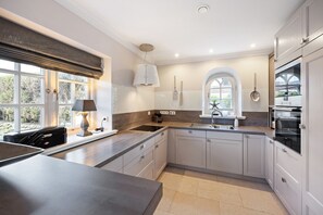 Fridge, microwave, oven, stovetop - Family & Friends - Family. Friends. Sauna (Westerland)