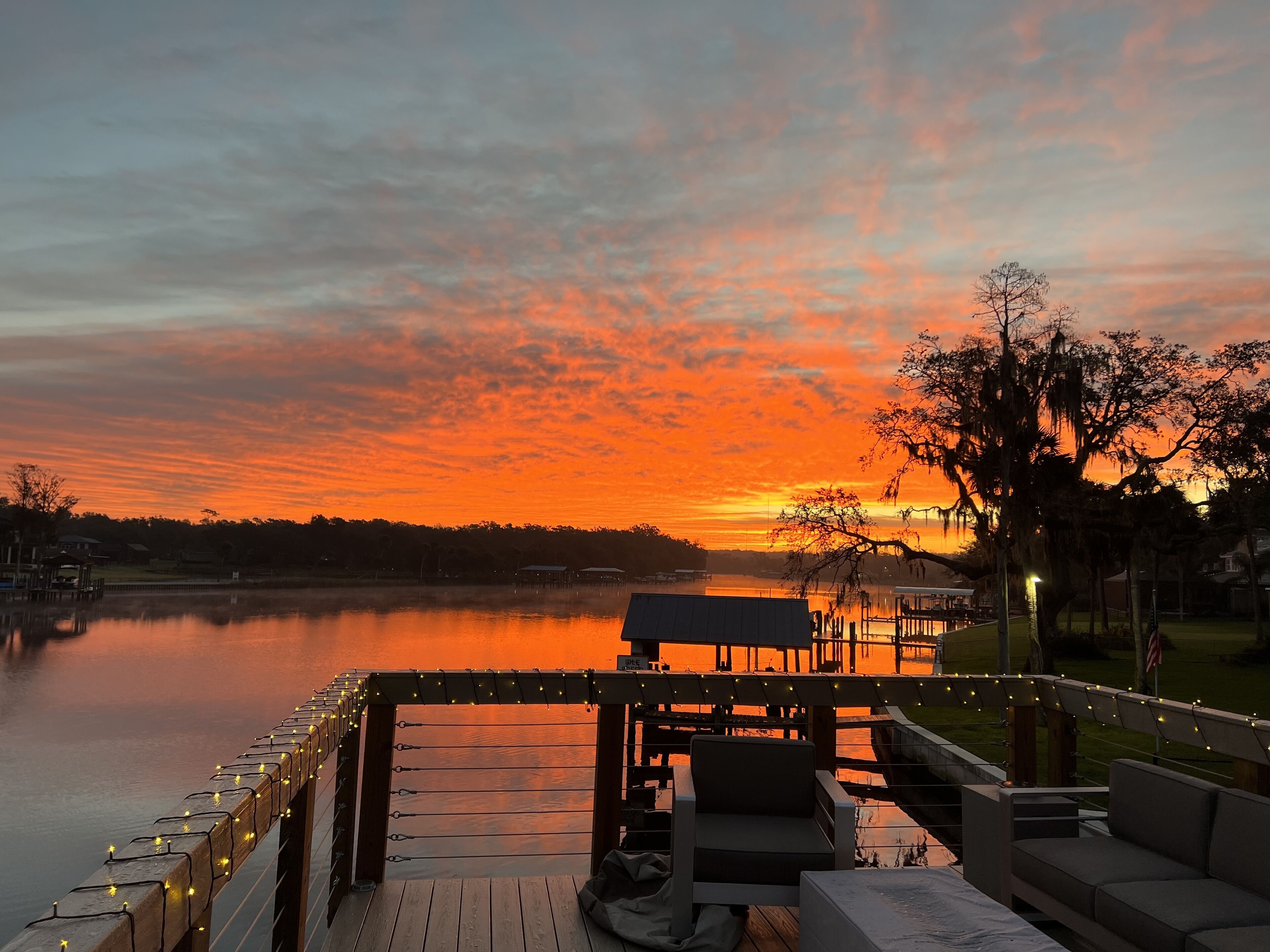 River House w/ 2-story dock, boat ramp, fire pits outdoor lounge area.