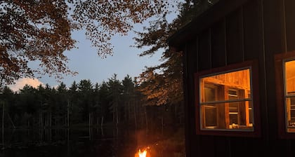 Cabin on a private lake + RV hookup. Surrounded by trails, lakes, and wildlife