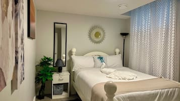 Suite, 1 Bedroom, Non Smoking, Garden View | Egyptian cotton sheets, premium bedding, pillowtop beds, in-room safe
