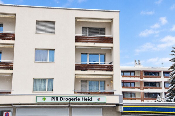 A multi-story building with a sign for 'Pill Drogerie Heide' indicating a pharmacy. - Central base for biking and skiing (Lenzerheide/Lai)