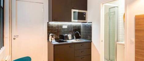 Fridge, microwave, coffee/tea maker, toaster