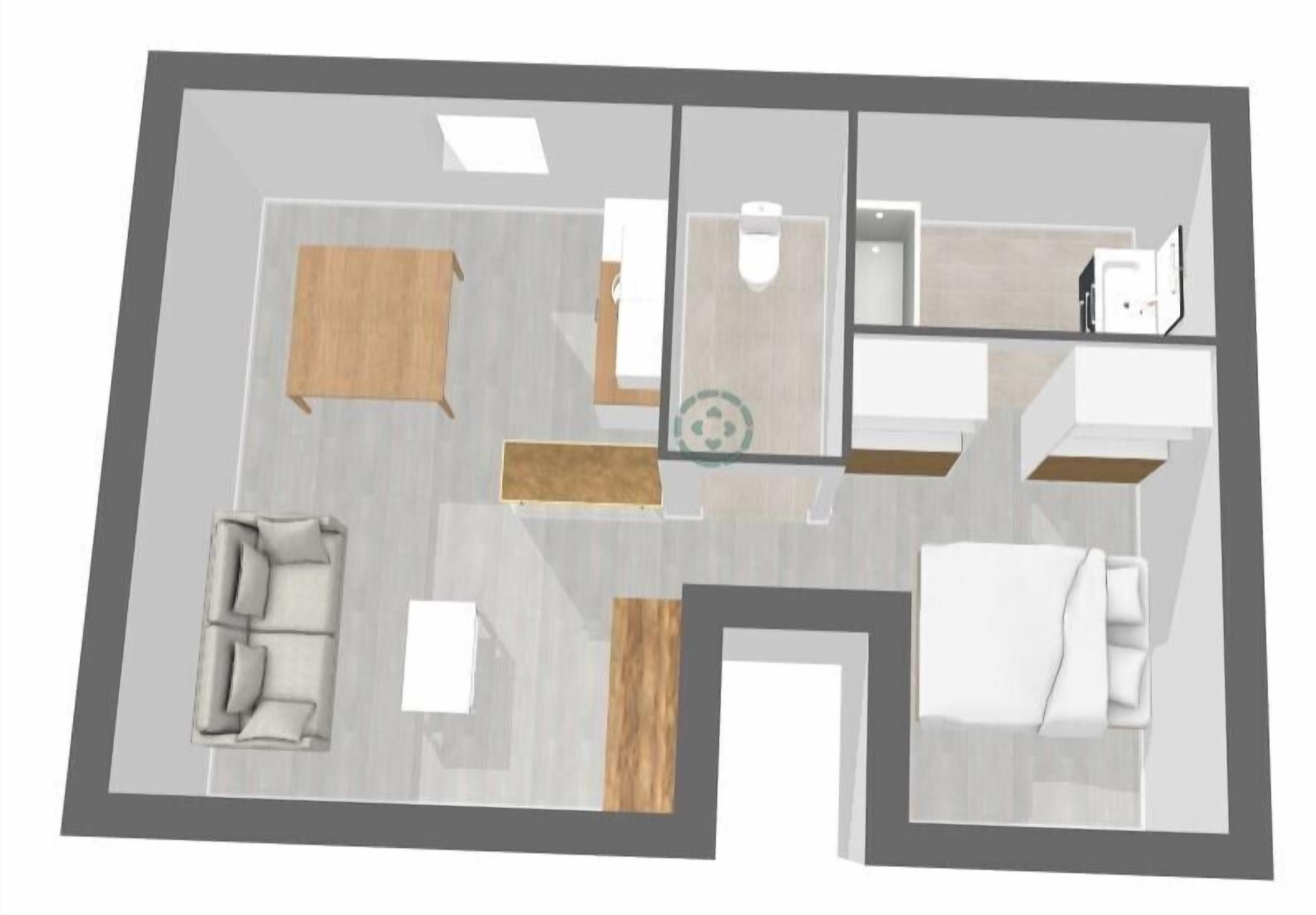 Un plan en 2D d’une chambre d’hôtel comprenant un canapé, un lit, un bureau et une salle de bain.