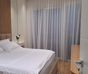 1 chambre, fer et planche à repasser, Wi-Fi, literie fournie