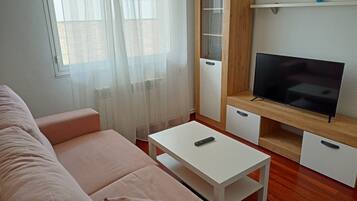 Economy-lejlighed | Opholdsområde | Fladskærms-tv