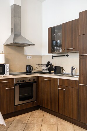 Deluxe-Apartment | Eigene Küche | Kühlschrank, Mikrowelle, Ofen, Herdplatte